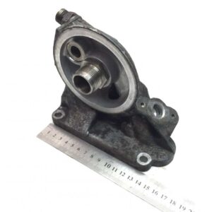 Suport filtru de ulei Scania 1502756 – Piesa auto metalică cu conectori filetati și bază cu găuri de montare